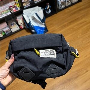 The North Face Black Belt Bag with Yellow Accents